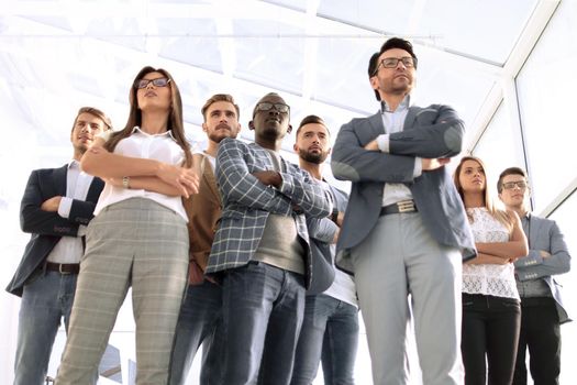 bottom view.group of confident young people standing in the office