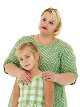 Happy family mom and little daughter, studio portrait on white background.Isolated.