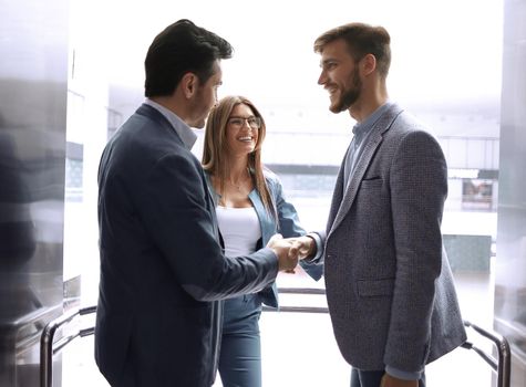 business people stretching out their hands for a handshake.concept of partnership