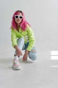 fashionable woman green jacket fashionable clothes studio model. High quality photo