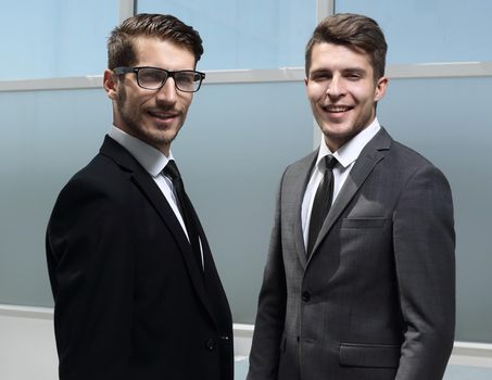two young business men isolated on office