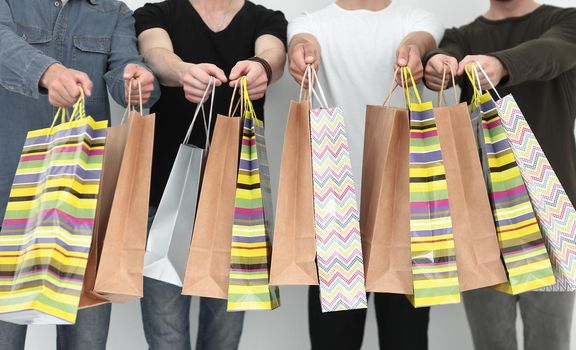 close up.group of students with shopping bags .shopping and lifestyle