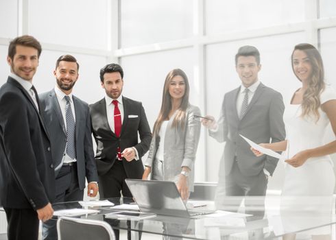 professional business team in the workplace.the concept of teamwork