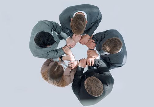 top view .business team standing in a circle .the concept of teamwork