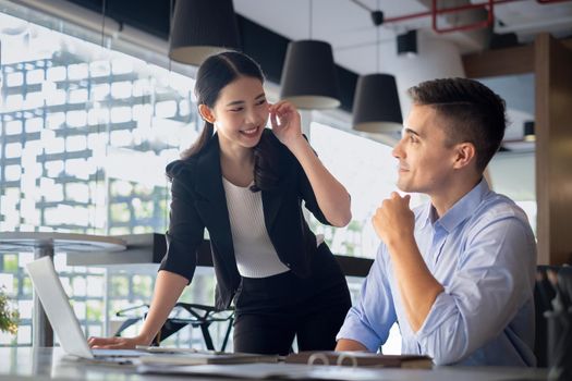 Business woman and Accountant brainstorming or discussing about fund investment and finance.