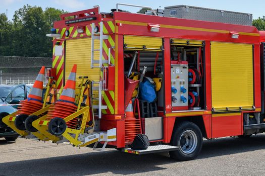 Big red fire engine with fire equipment