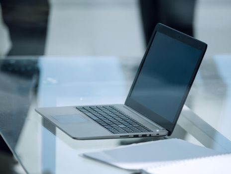 laptop, digital tablet and notebook on transparent office Desk.business concept
