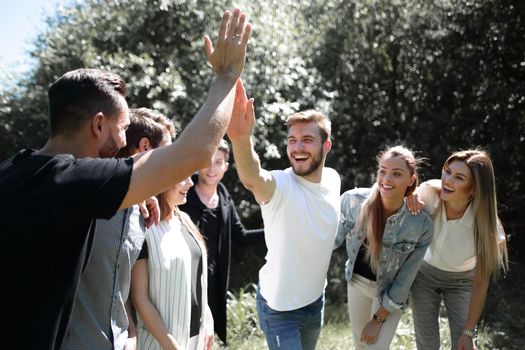 best friends give each other a high five.the concept of team building