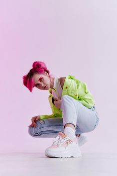 woman with pink hair youth style posing lifestyle neon. High quality photo