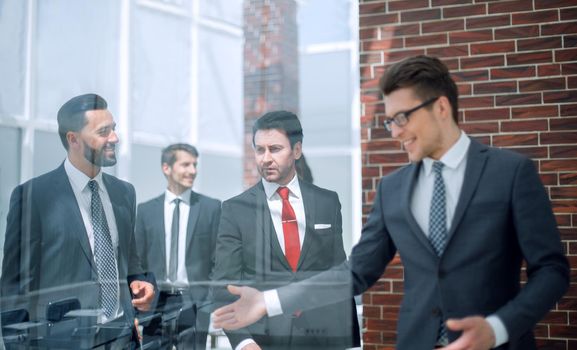 background image of a group of business people standing in the office.business background