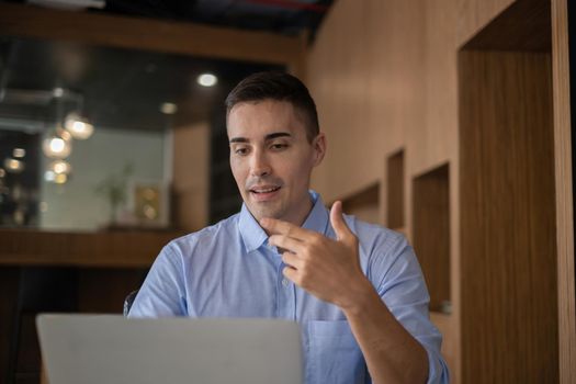 Businessman having video call brief project with his business team from home. finance concept.