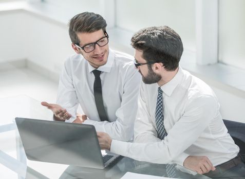 two business colleagues looking at the laptop screen.photo with copy space