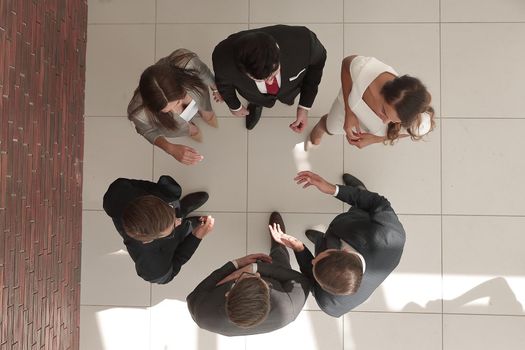 top view. business team solving work problems.the concept of teamwork