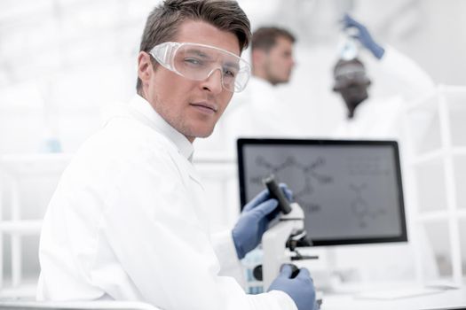 close up. scientist microbiologist at the laboratory table .science and technology