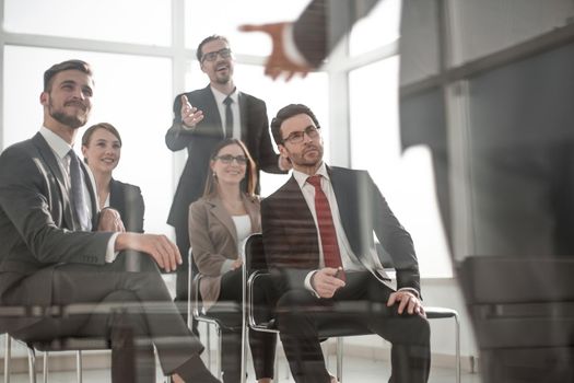 head and business team at a business meeting to discuss. business meeting concept