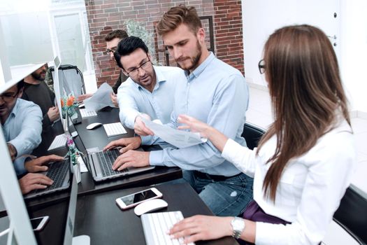 employees use computers to work with business documents .people and technology