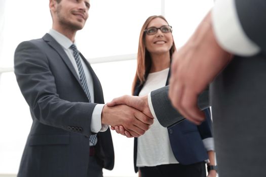 Handshake of two businessmen as sign of closing deal