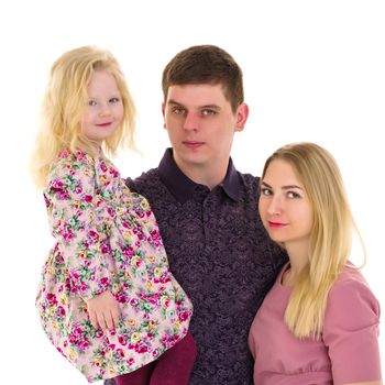 Happy family couple on a black background. Studio portrait.