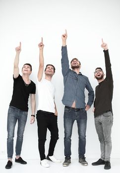 group of young people points up.isolated on white background