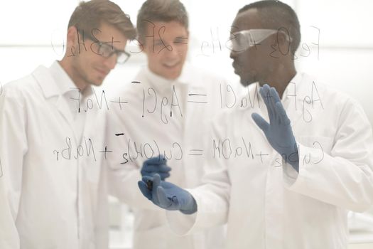 group of scientists discuss the results.concept of education