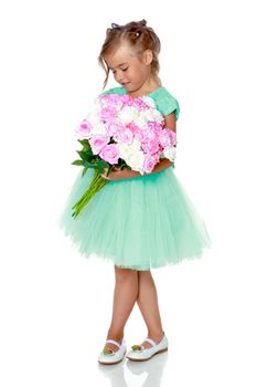 Little girl with a beautiful bouquet of flowers. The concept of holidays, family and children. Isolated on white background.