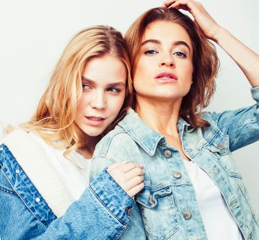 best friends teenage girls together having fun, posing emotional on white background, besties happy smiling, lifestyle people concept close up.