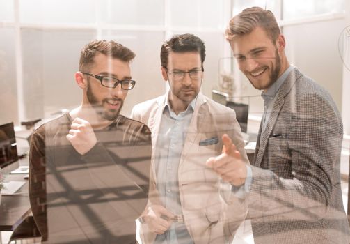 business people discuss problems standing in the office.business concept