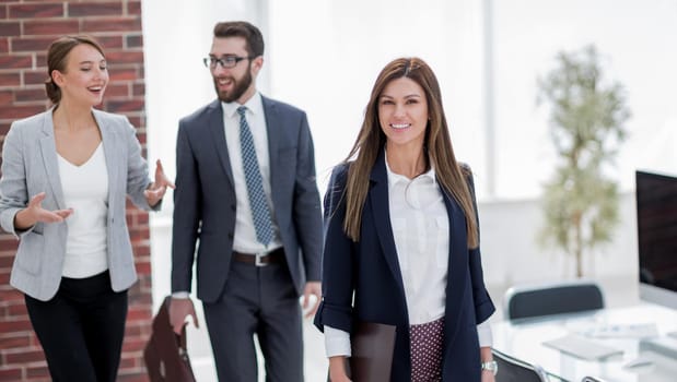 business woman and employees in the workplace.photo with copy space