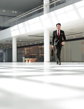 businessman out of the office building .photo with copy space