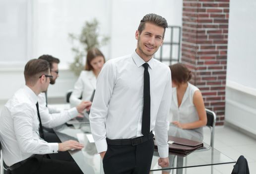 successful young businessman standing in the office .photo with copy space