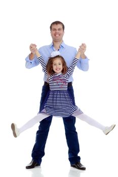 Happy young dad raise his beloved daughter's hands.Isolated on white background.