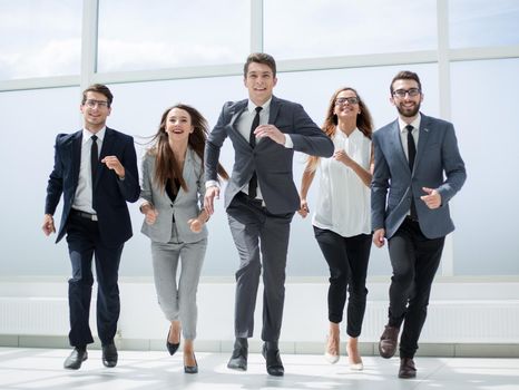 in full growth.a group of business people walking together.photo with copy space