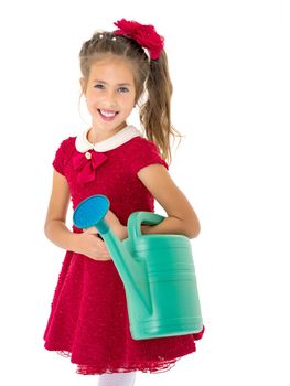 A little girl is holding a garden watering can. The concept of ecology, healthy lifestyle. Isolated on white background.