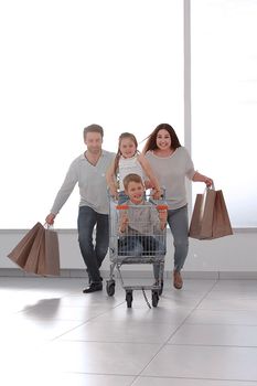 happy family in a hurry to shop.photo with copy space