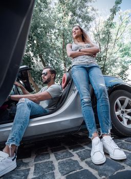 young couple enjoying the journey. traveling by car