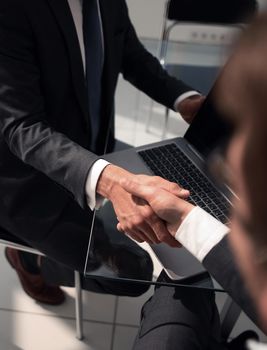 close up.handshake business people in the Bank office.business concept