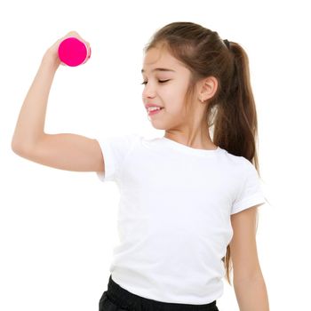 A teenage girl with dumbbells in her arms performs exercises in the fitness club. The concept of sport and a healthy lifestyle of the younger generation. Isolated over white background