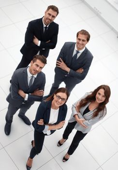Top view of business people with their hands together in a circle