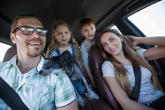 close up. happy family travels in a comfortable car.family holiday concept