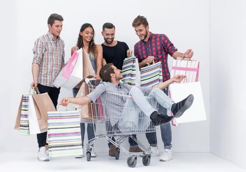 cheerful group of young people with shopping bags.photo with copy space