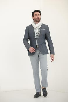 full height.confident business man.isolated on light background