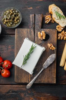 Cheese feta greek salad ingredient, on dark wooden background, flat lay