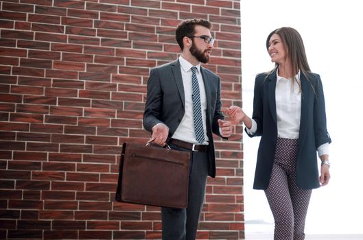 business couple on the background of a modern office.photo with copy space