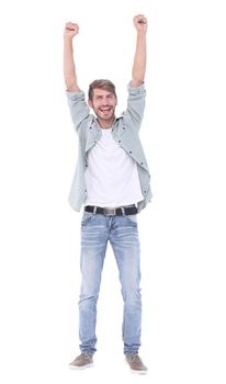 in full growth. a very happy young man .isolated on white background