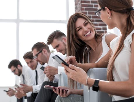 employees discussing something in the waiting room.photo with copy space