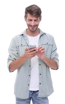 smiling man reading an SMS on the smartphone.isolated on white background