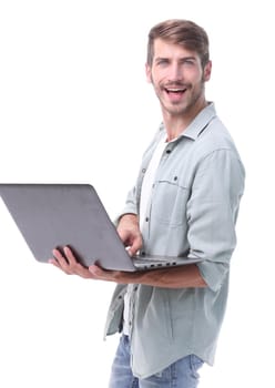 close up. happy young man with laptop .isolated on white background