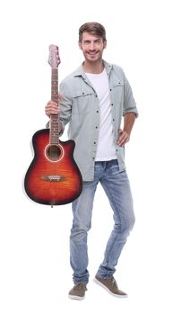 in full growth.a young man with a guitar.isolated on white background