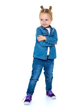 Beautiful little girl in a denim suit. The concept of style and fashion. Isolated on white background.