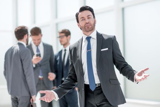 successful businessman inviting you to his office.photo with copy space